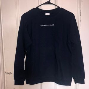 navy graphic crewneck “you’re too close”